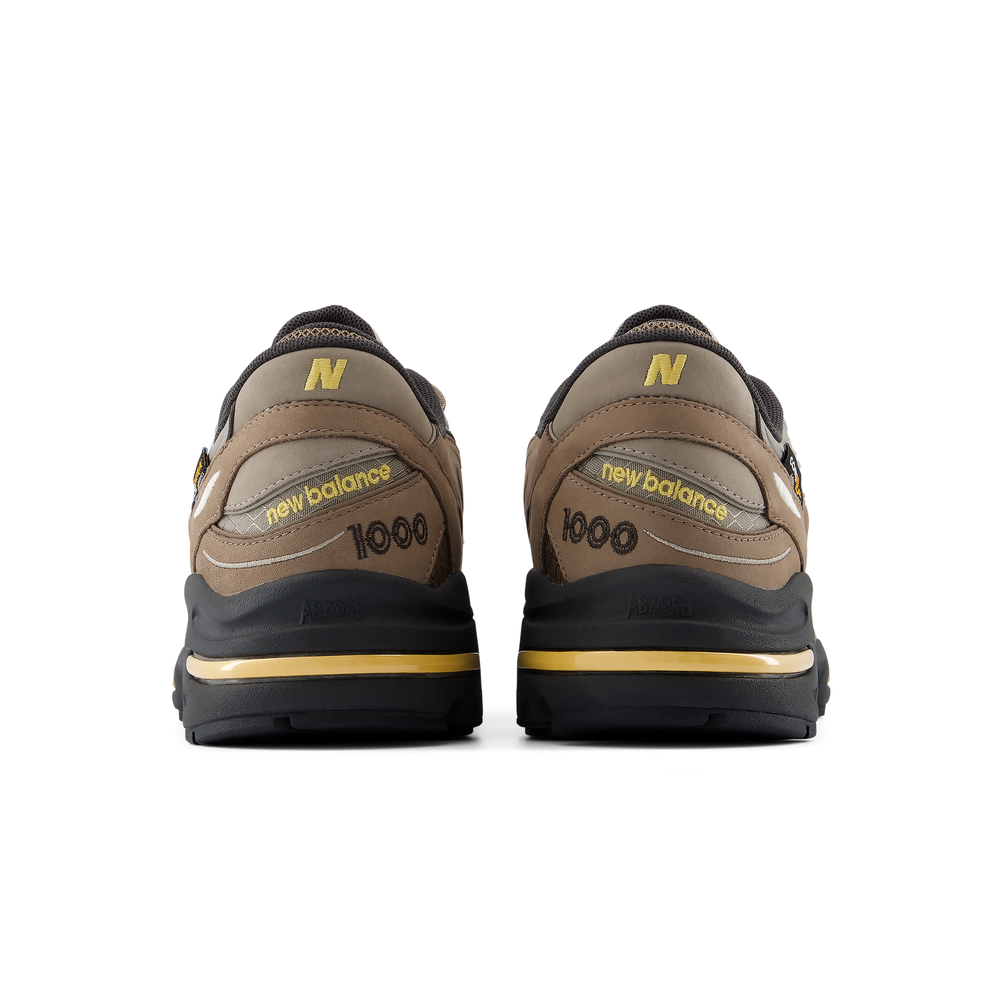 Unisex topánky New Balance U100079S – hnedá