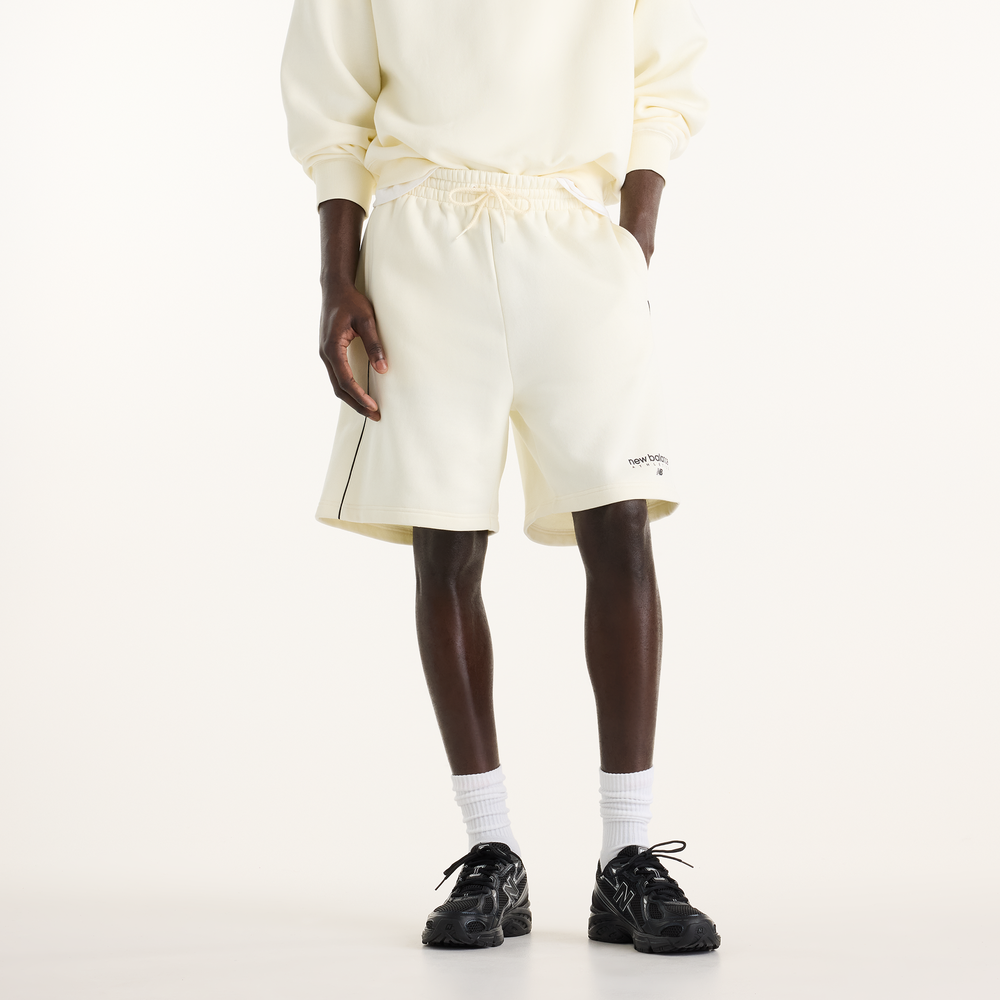 Pánske šortky New Balance MB62L72AAGA – béžové