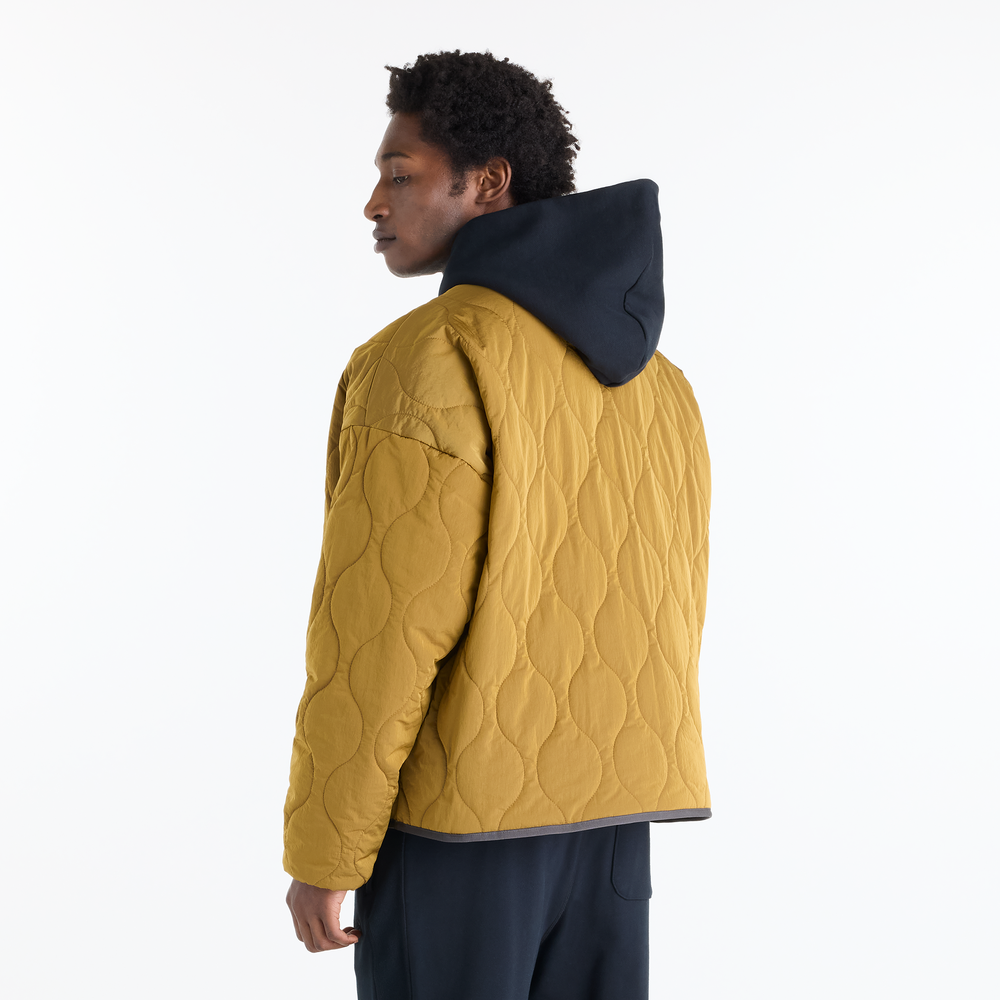 Pánska bunda New Balance Quilted Bomber – žlté