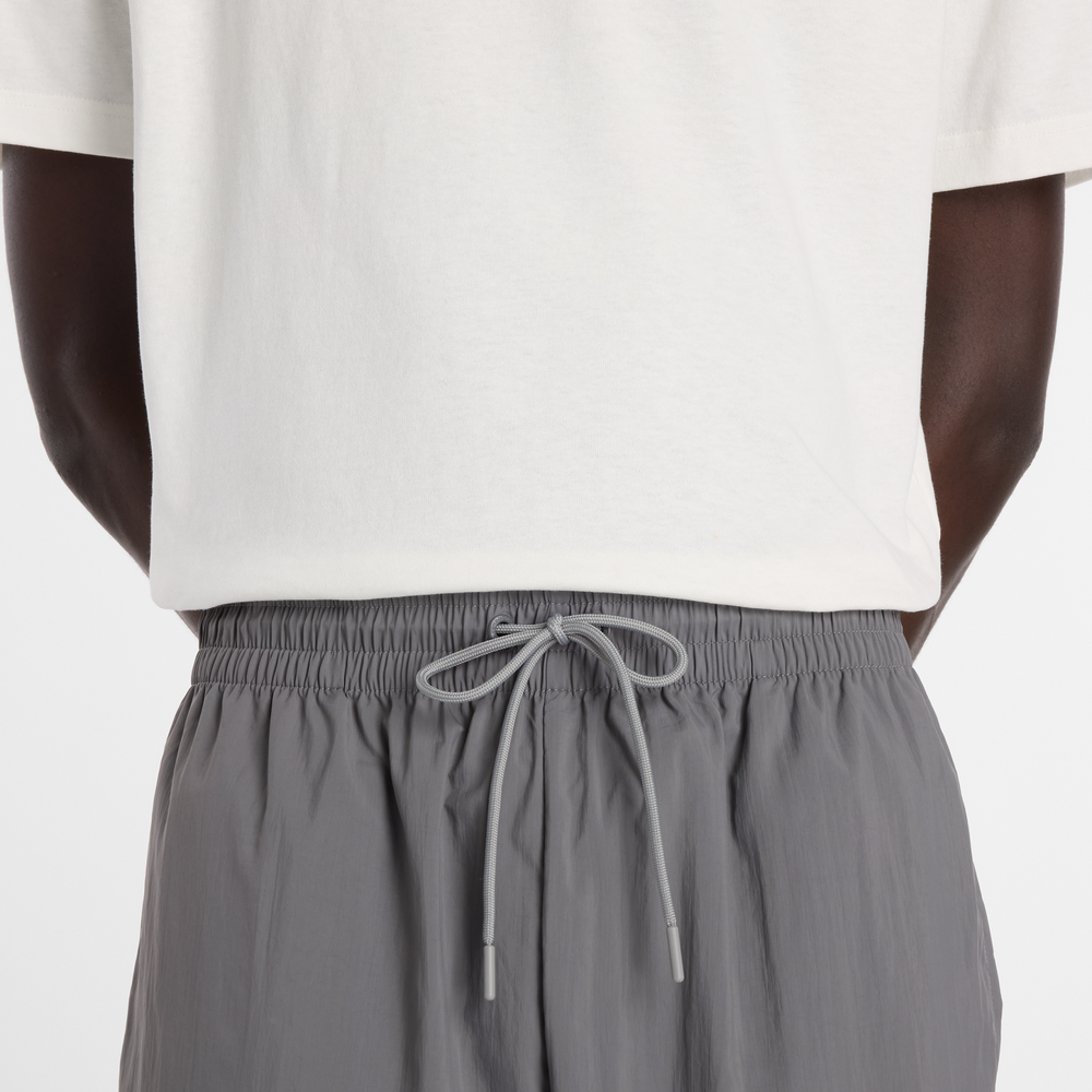 Pánske nohavice New Balance MB61R010CAS – sivé