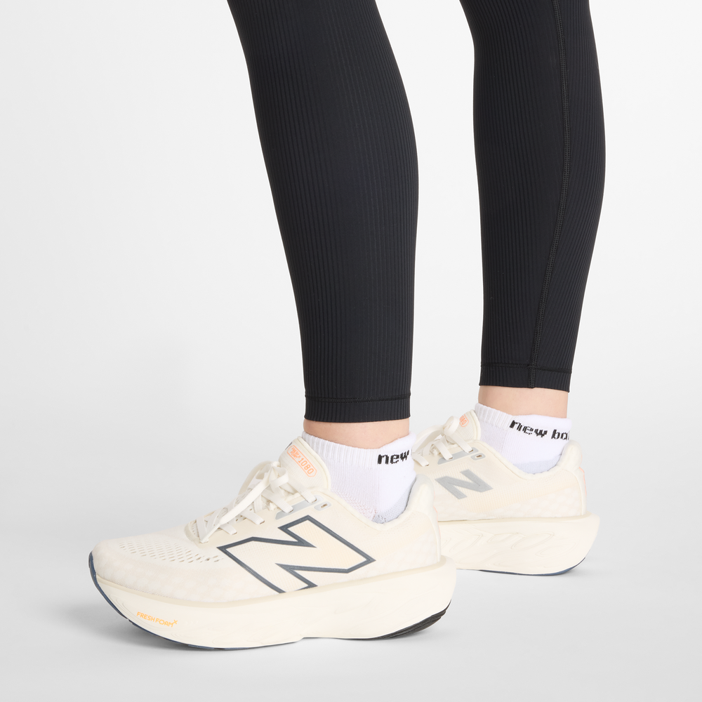 Dámske legíny New Balance WP53152BK – čierné
