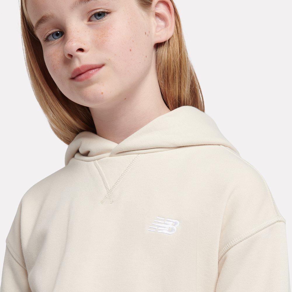 Detská mikina New Balance LAKG0056LIN – béžové