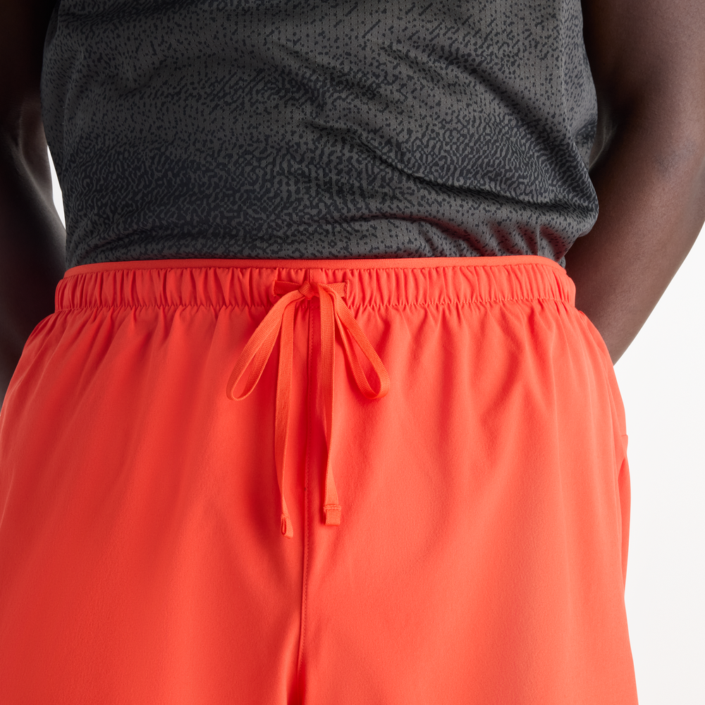 Pánske šortky New Balance RC Essential – oranžová