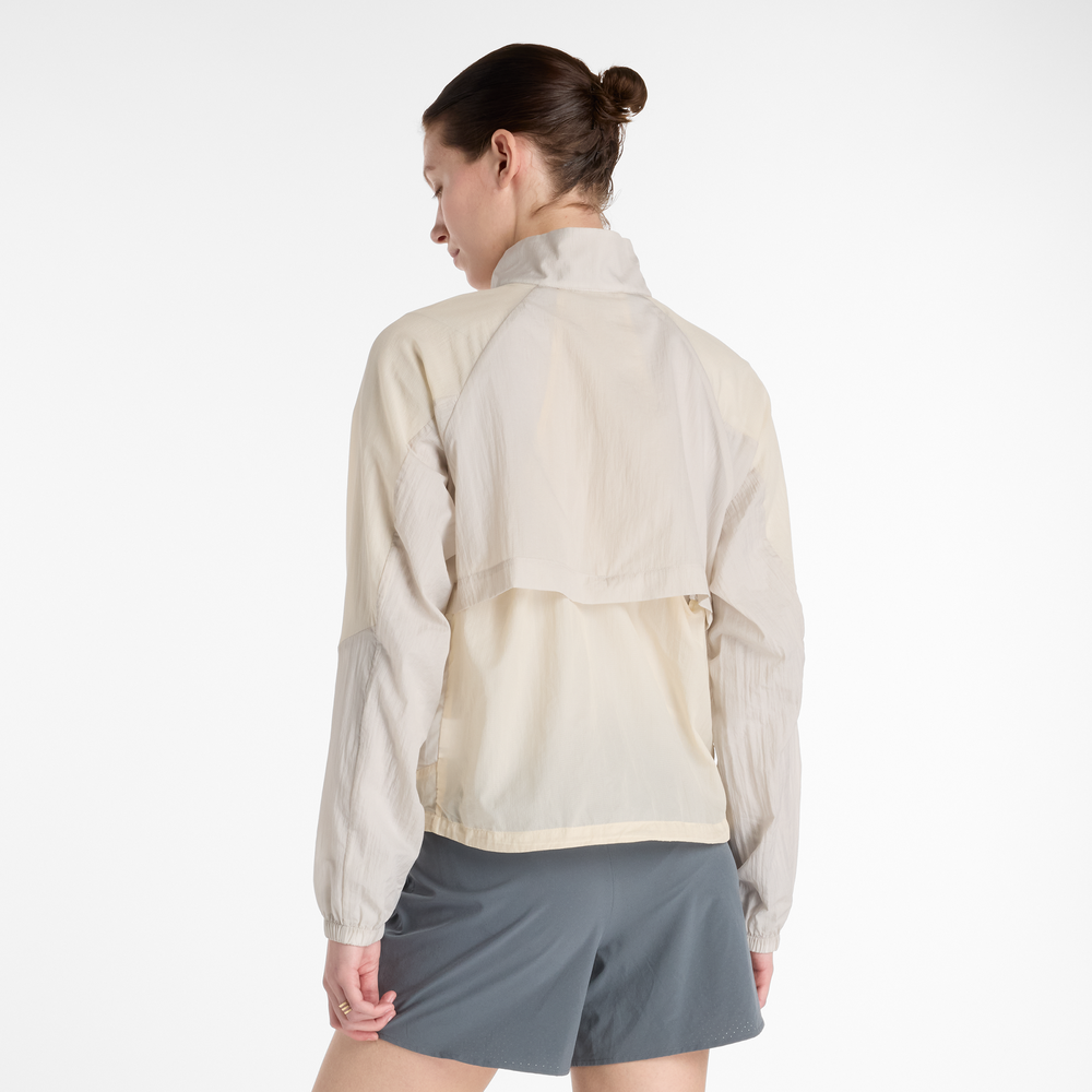 Dámska bunda New Balance WO53206LIN – béžové
