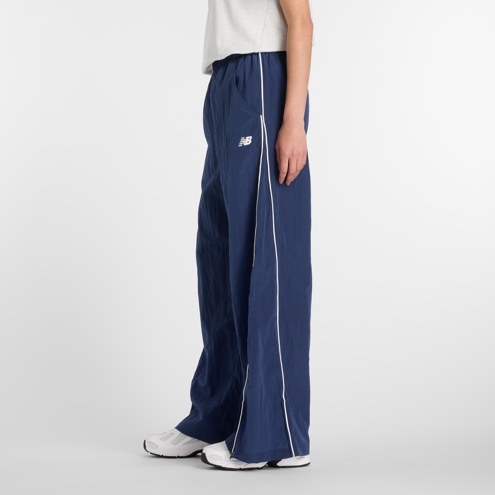 Dámske nohavice New Balance WB61Z1E6NNY – tmavomodrá