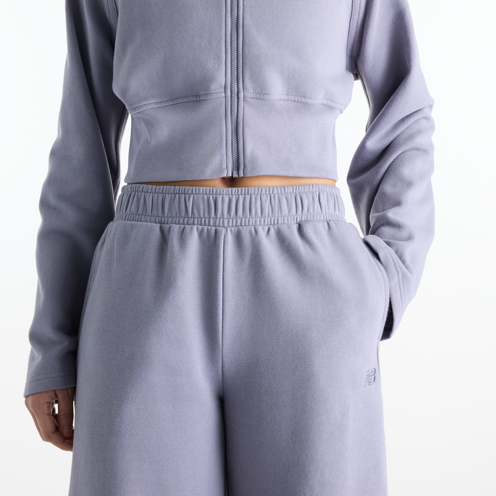 Dámske nohavice New Balance Brushed Coastal – fialové