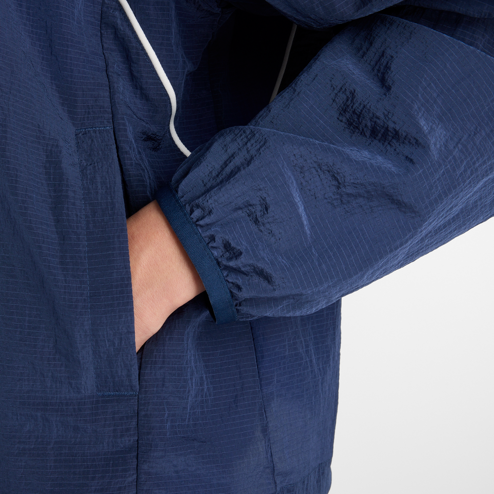 Dámska bunda New Balance WJ6113KSNNY – tmavomodrá