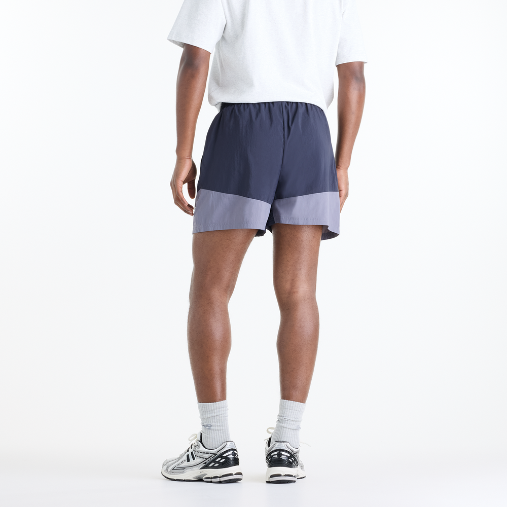 Pánske šortky New Balance Sport Legacy – fialové