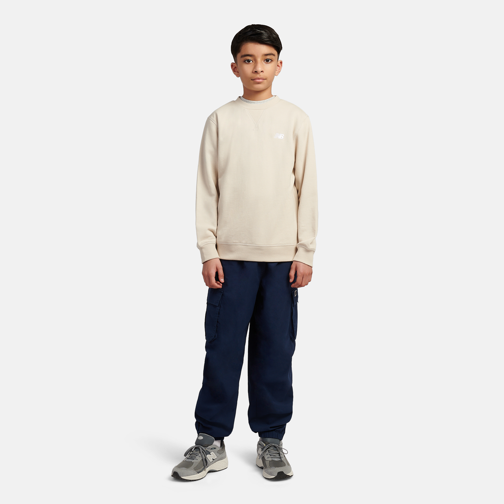 Detská mikina New Balance LAKB0055TWF – béžové