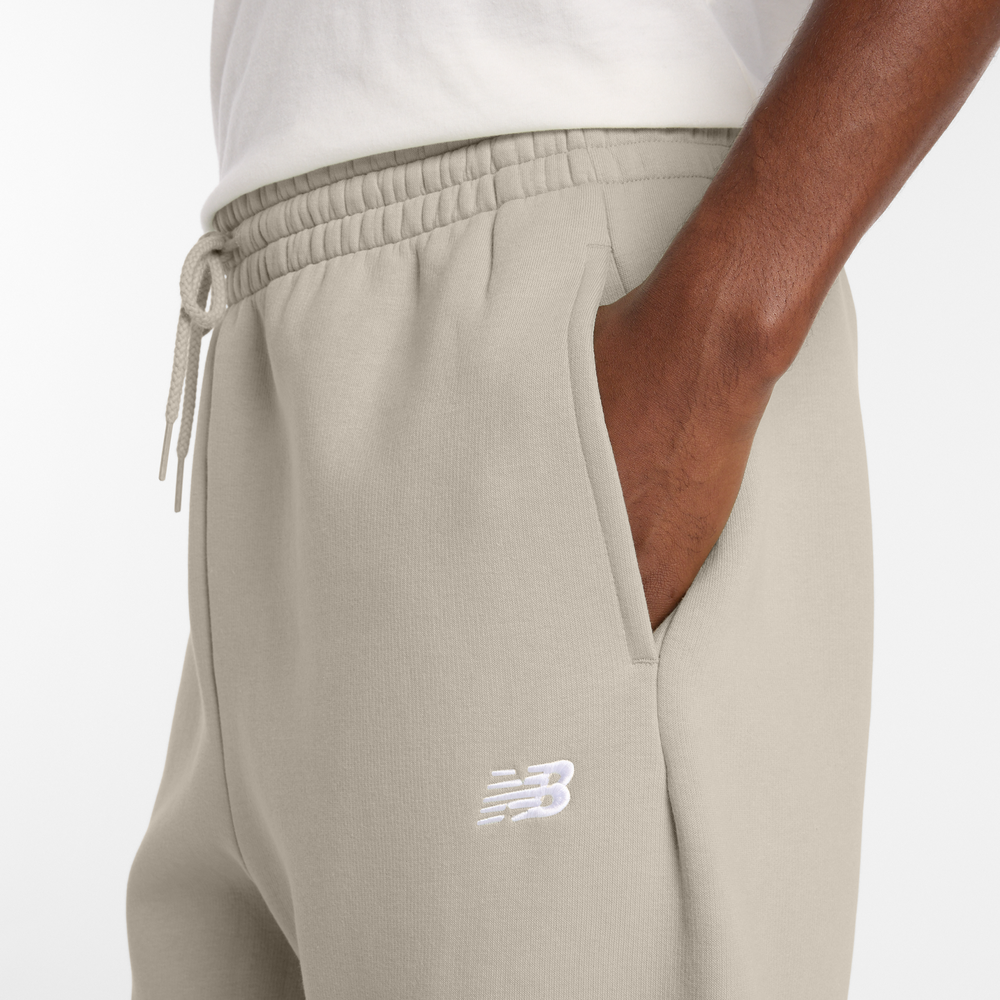 Pánske nohavice New Balance MP41503TWF – béžové