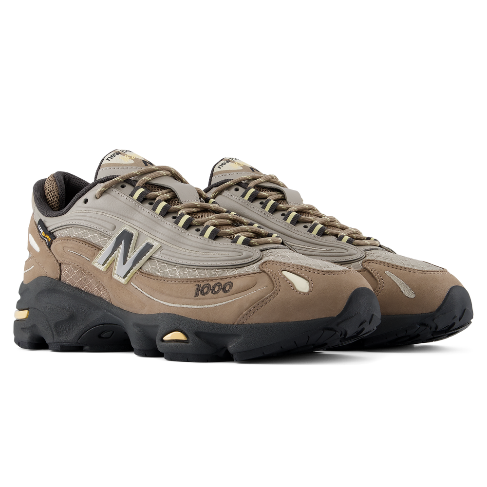 Unisex topánky New Balance U100079S – hnedá