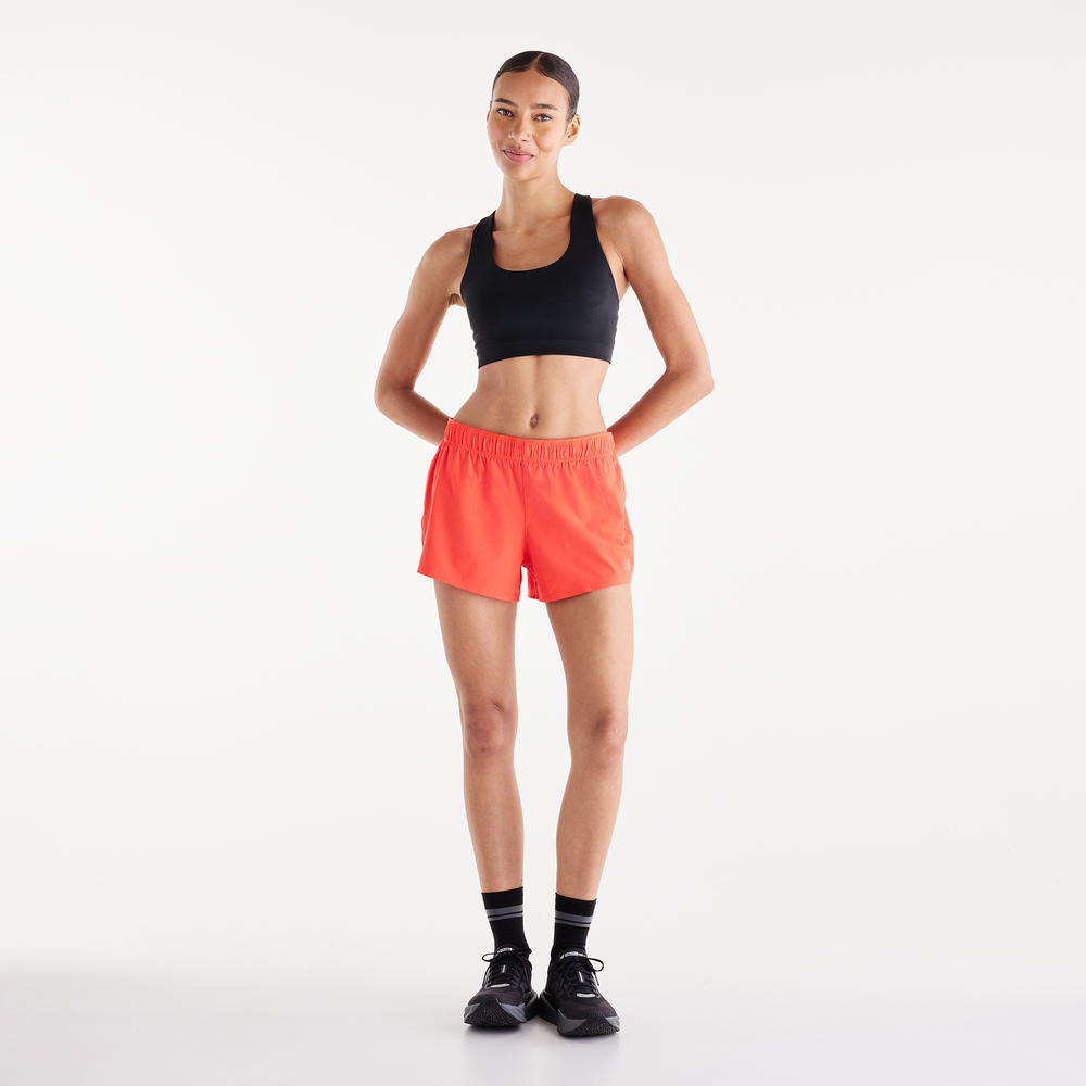 Dámske šortky New Balance RC – oranžová