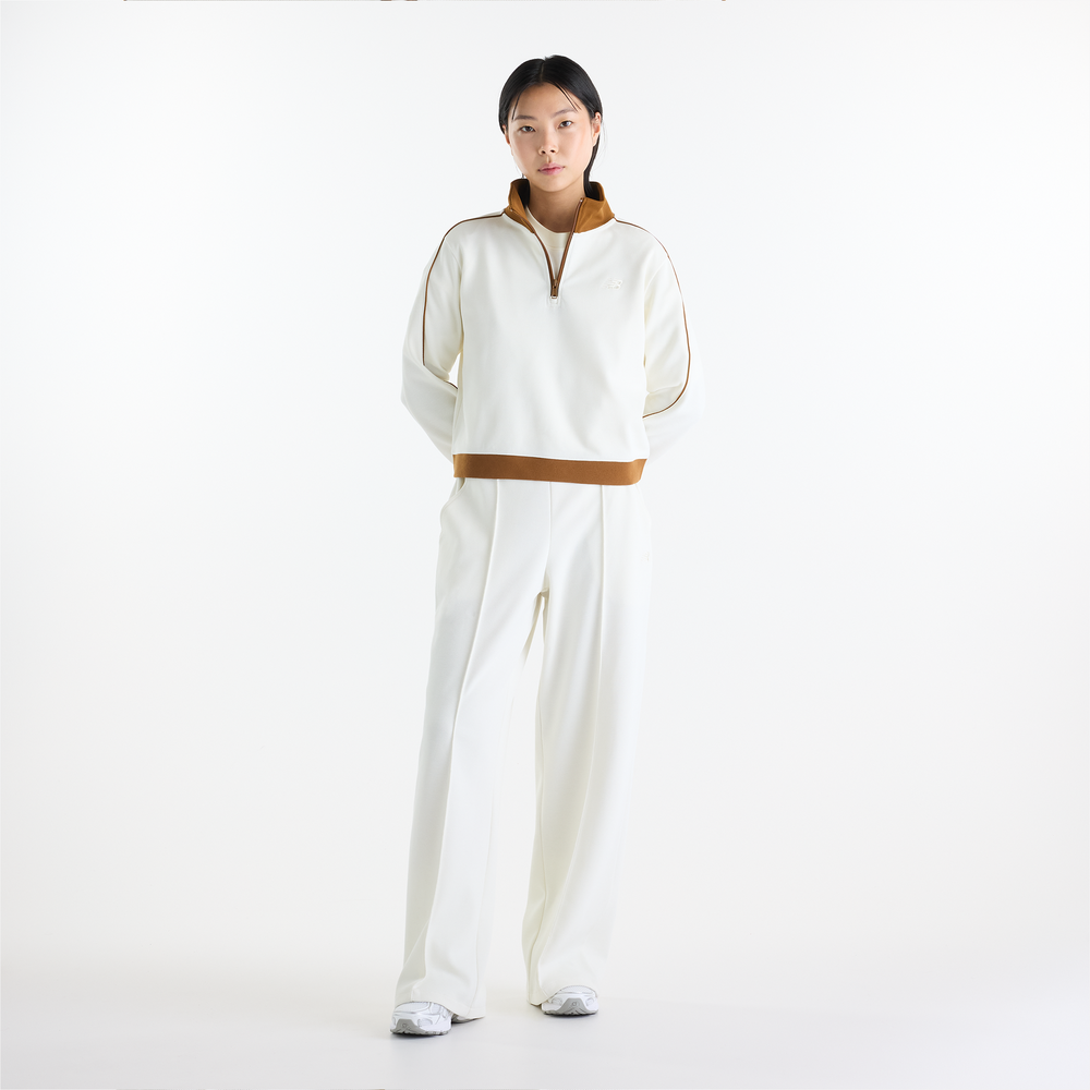 Dámske nohavice New Balance Sport Legacy – biele