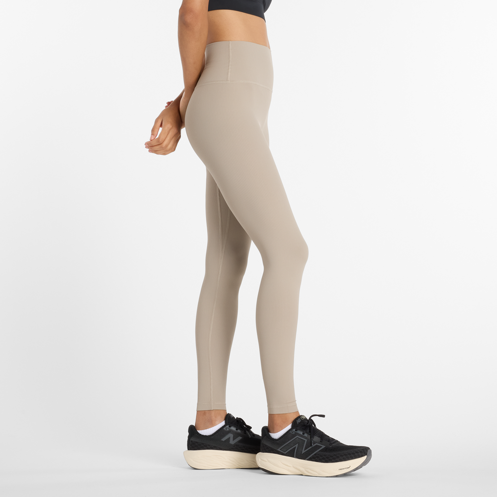 Dámske legíny New Balance WP53152ADS – béžové