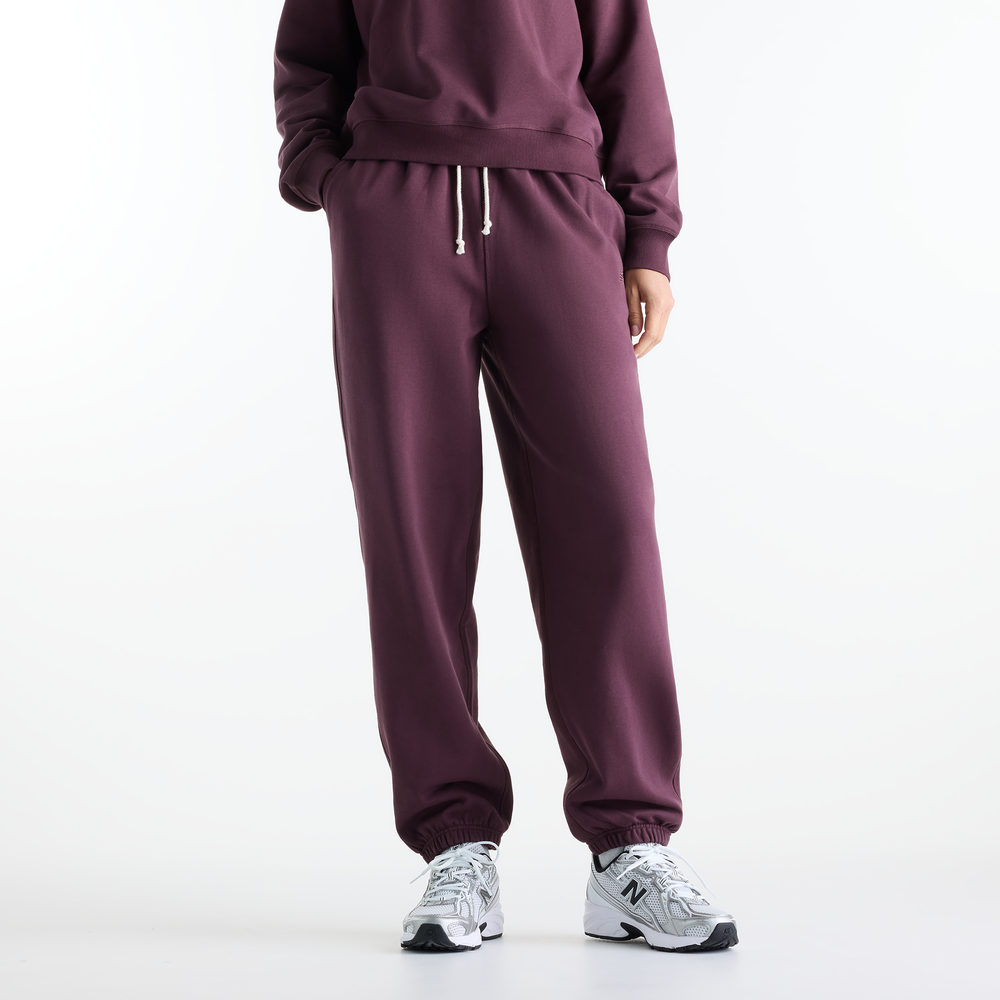 Dámske nohavice New Balance WP41513YLR – fialové