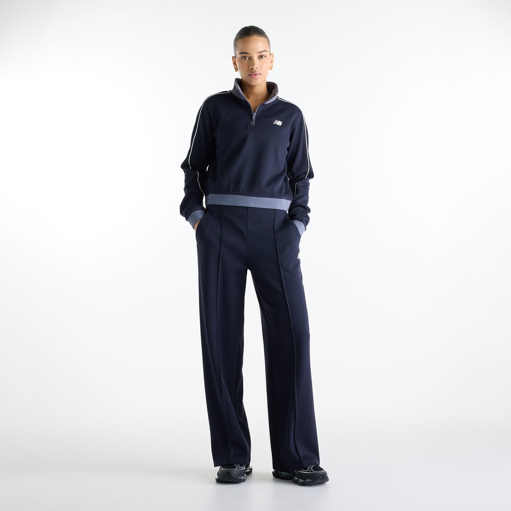 Dámske nohavice New Balance Sport Legacy – tmavomodrá