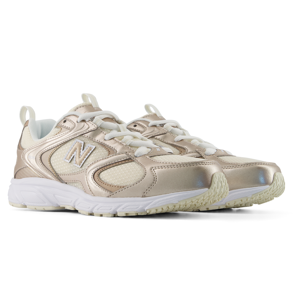 Dámske topánky New Balance W40815G – zlato