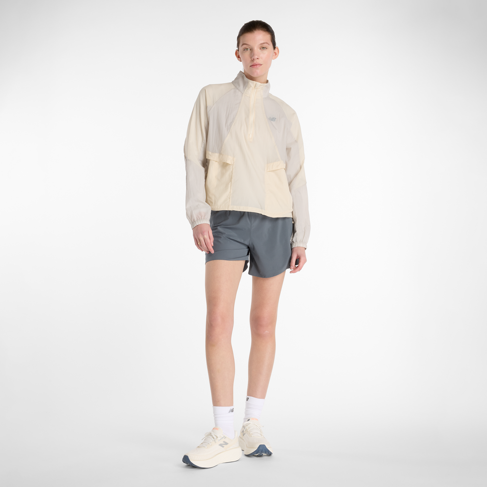 Dámska bunda New Balance WO53206LIN – béžové