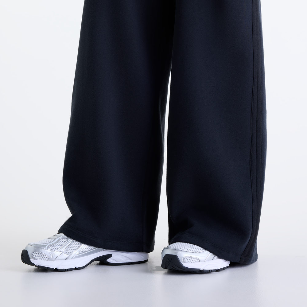 Dámske nohavice New Balance Brushed Coastal – čierné