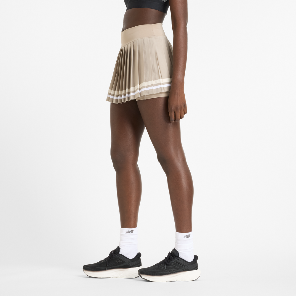 Dámska sukňa New Balance WK51402ADS – béžové