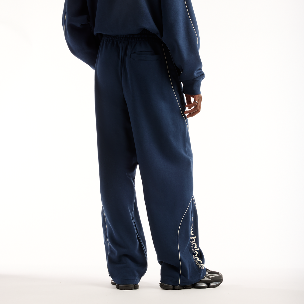 Pánske nohavice New Balance Trackside Pants – tmavomodrá