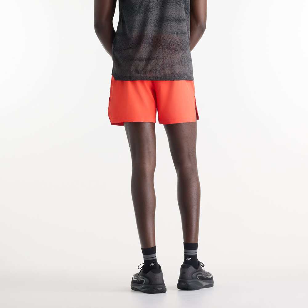 Pánske šortky New Balance RC Essential – oranžová