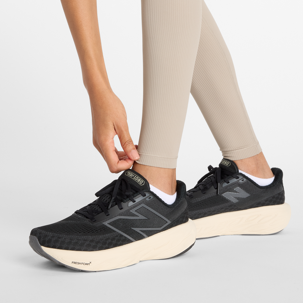 Dámske legíny New Balance WP53152ADS – béžové