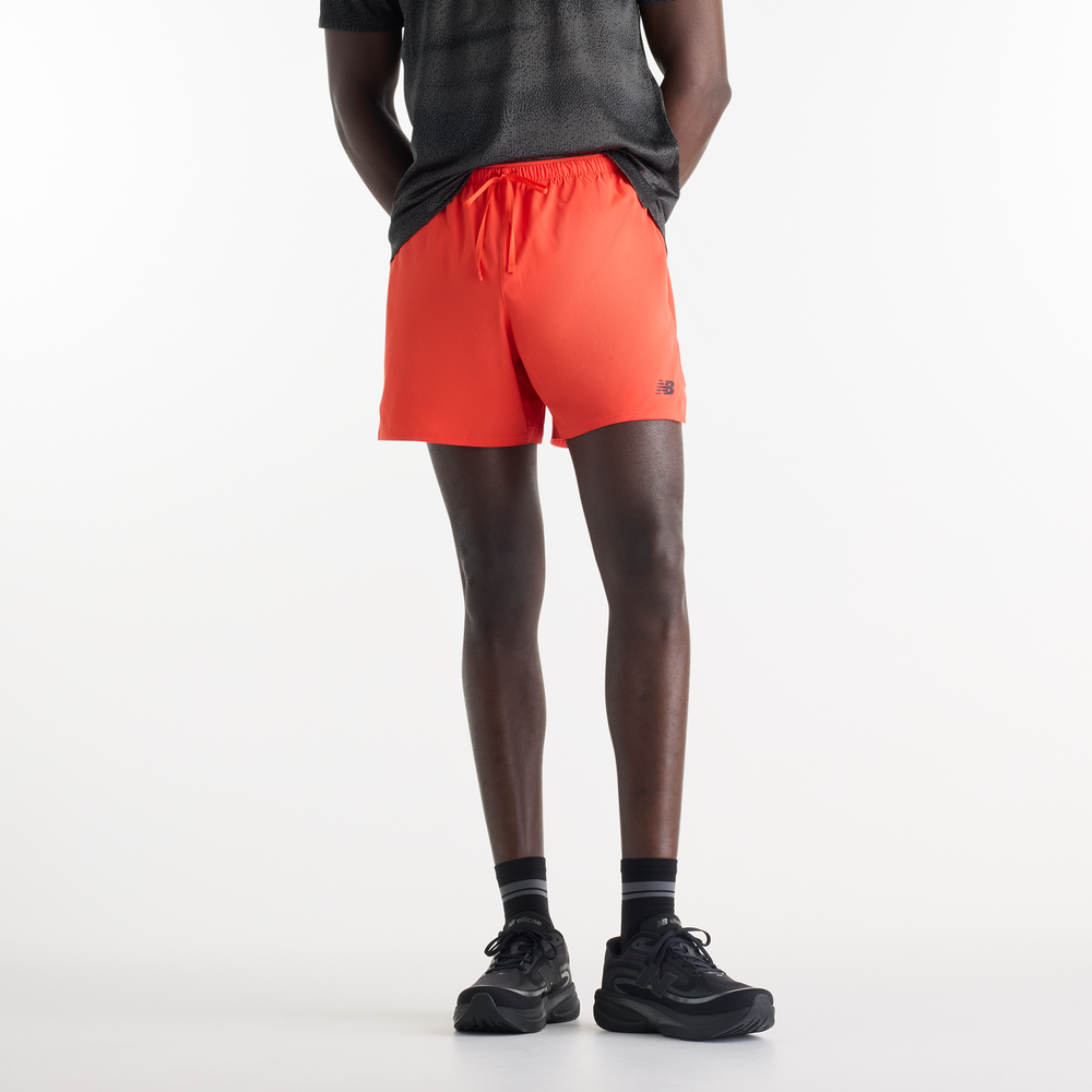 Pánske šortky New Balance MB6180TANEF – oranžová