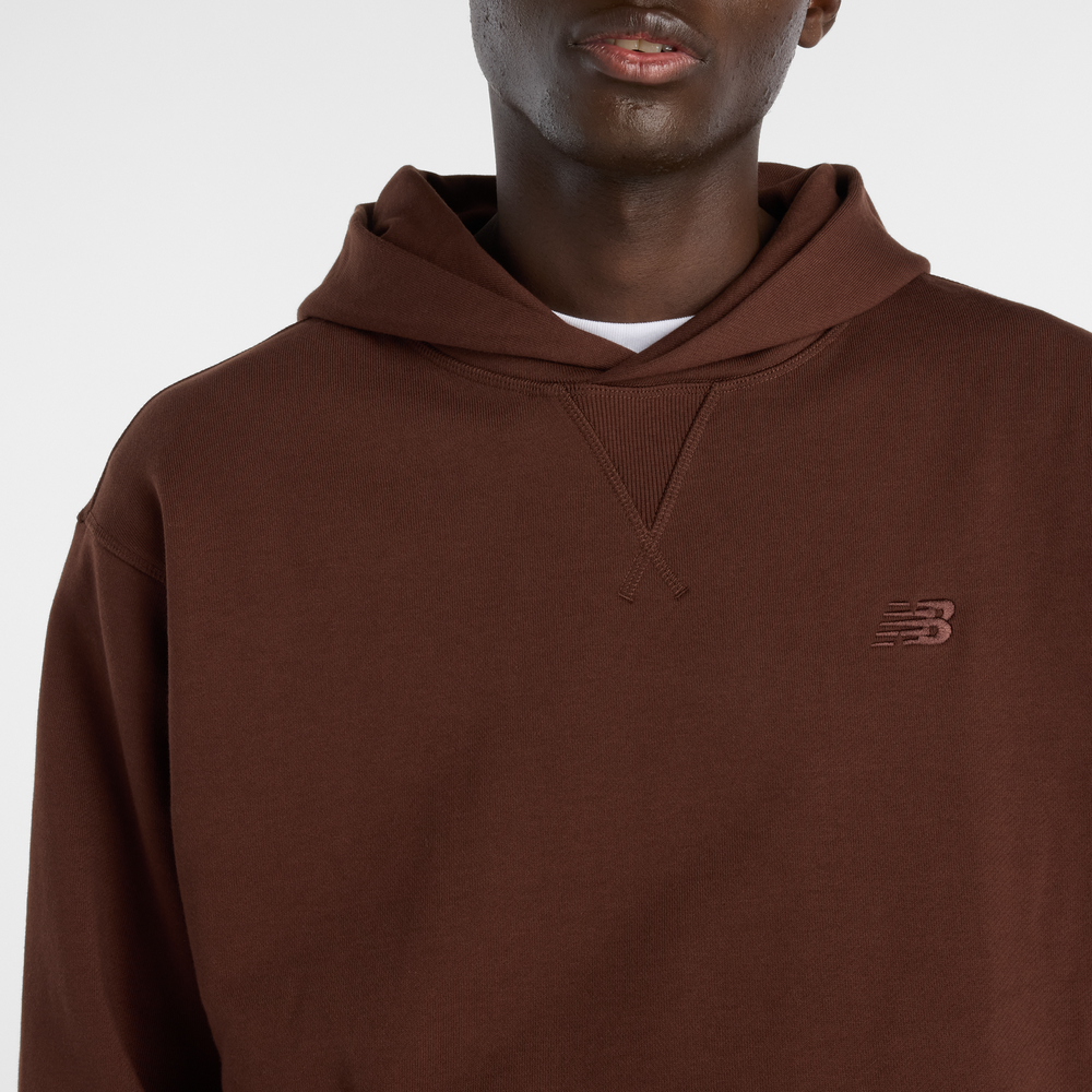 Pánska bunda New Balance MT41534ABJ – hnedá