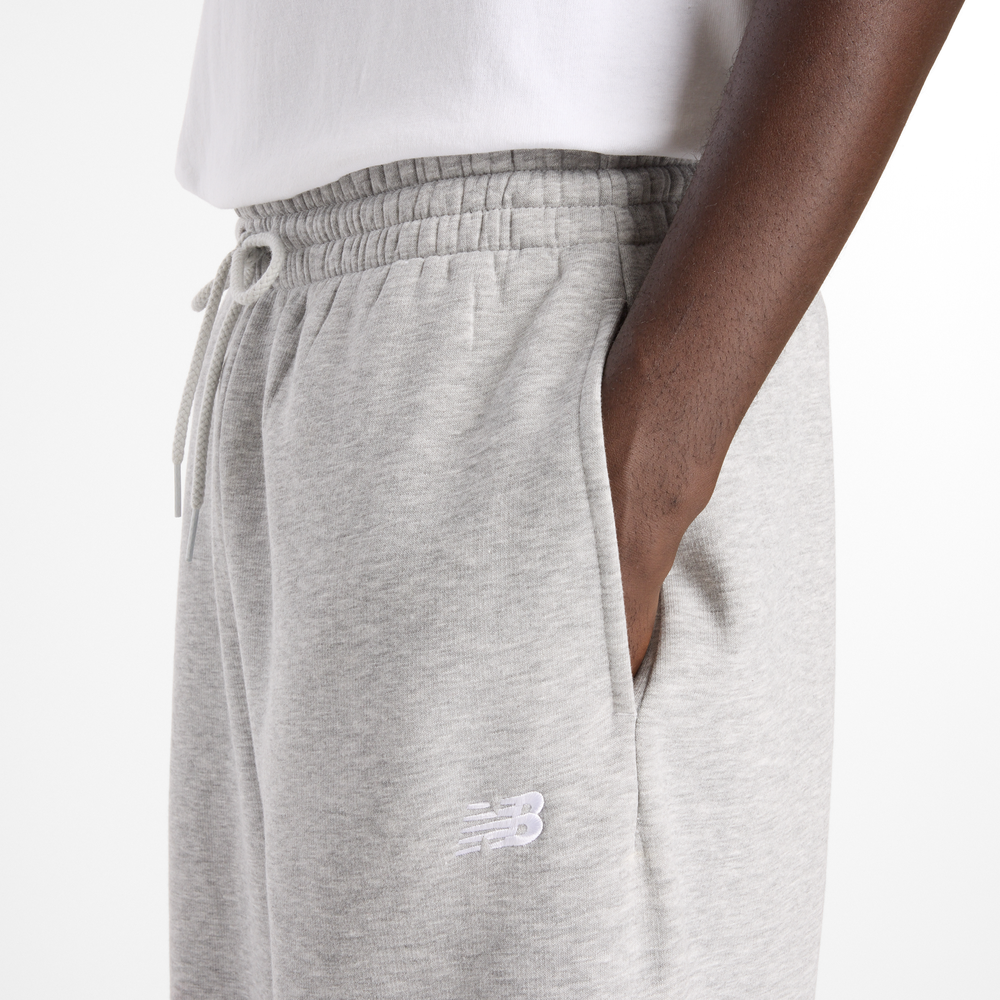 Pánske nohavice New Balance Sport Essentials – sivé