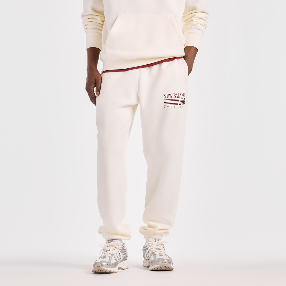 Pánske nohavice New Balance MB62S1NTAGA – béžové