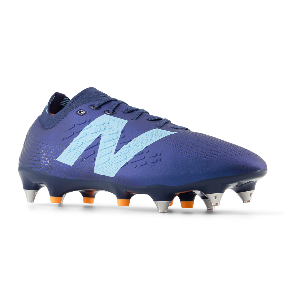 Futbalové topánky New Balance TEKELA PRO SG V4+ ST1SLN45 – tmavomodrá