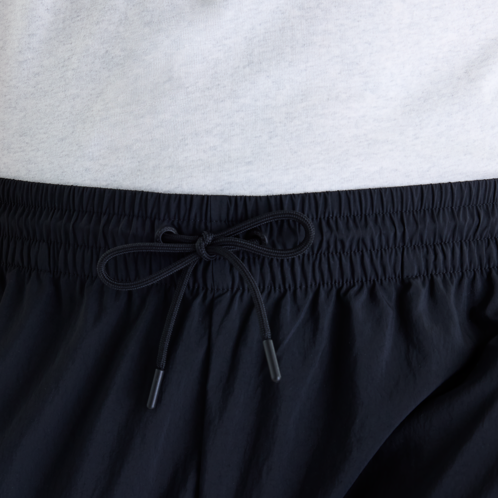 Pánske nohavice New Balance Sport Legacy – čierné