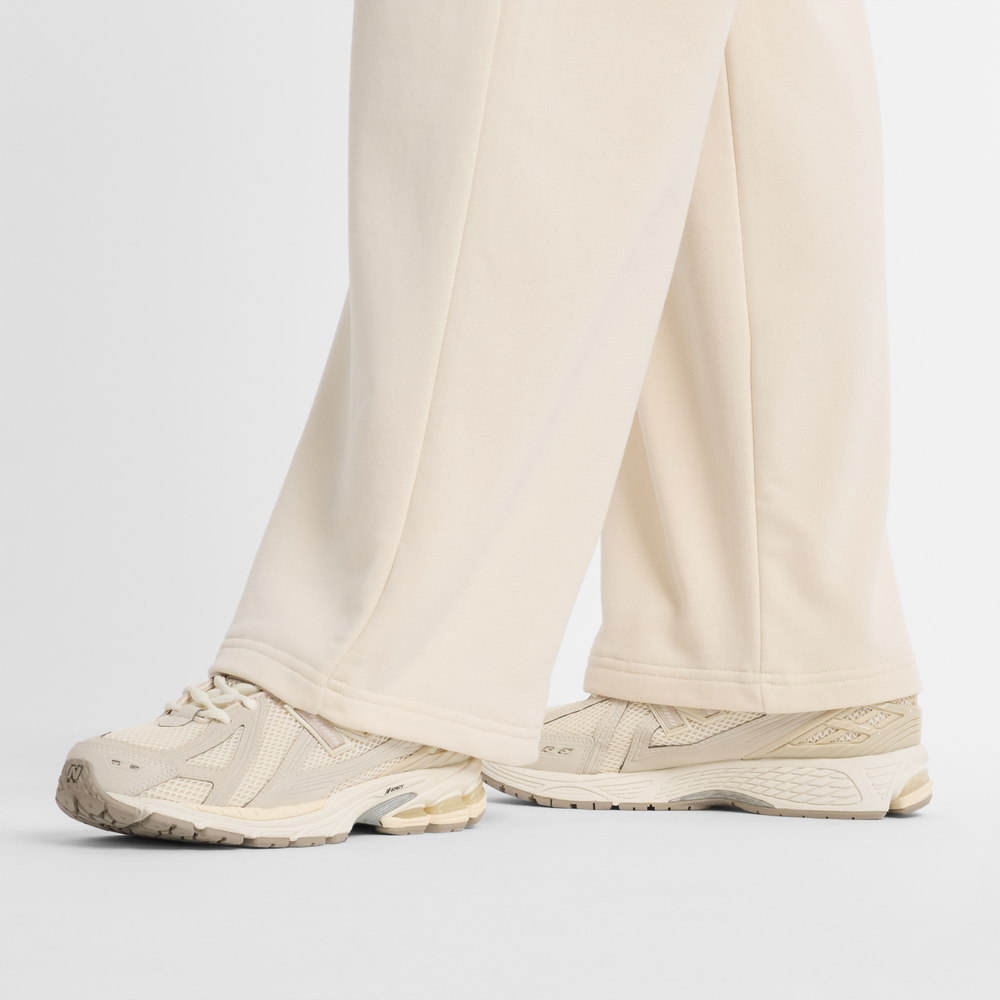 Dámske nohavice New Balance WP51503LIN – béžové