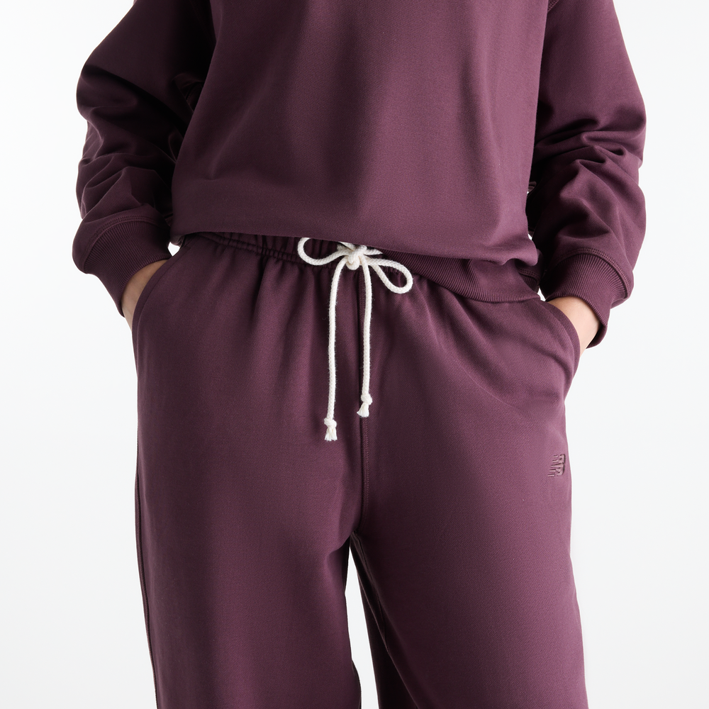 Dámske nohavice New Balance Athletics – fialové