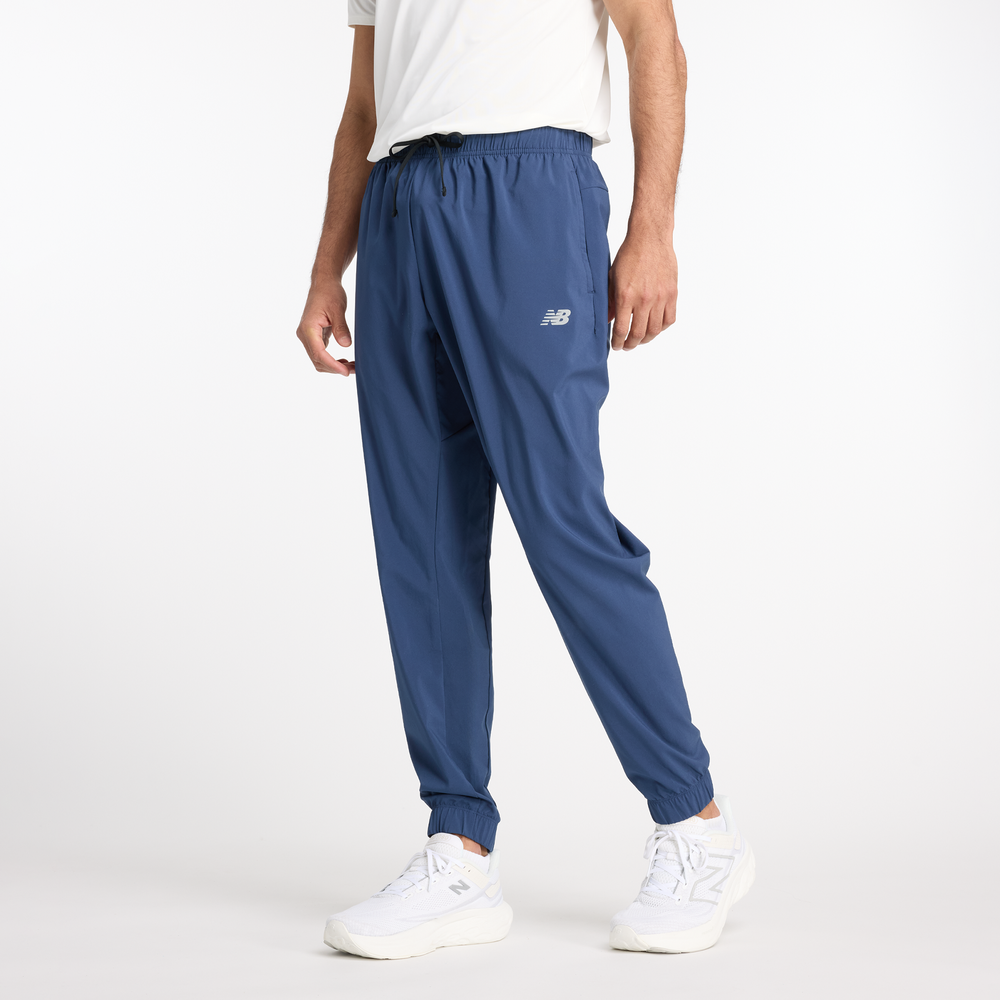 Pánske nohavice New Balance MP41011NNY – tmavomodrá