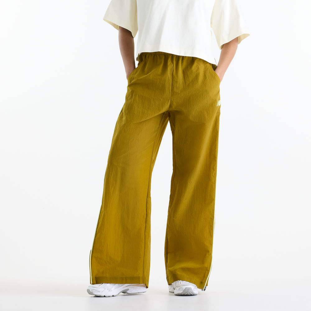 Dámske nohavice New Balance WB61Z1E6BIL – žlté