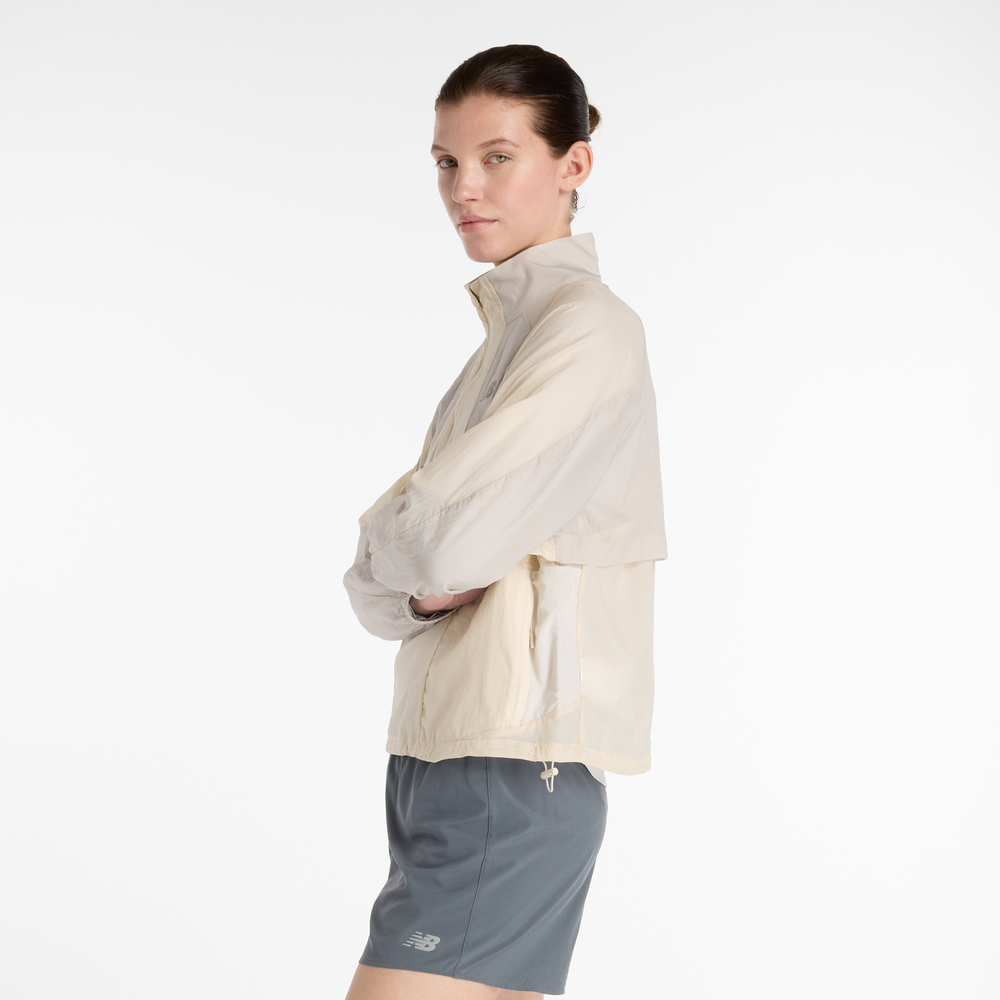 Dámska bunda New Balance WO53206LIN – béžové