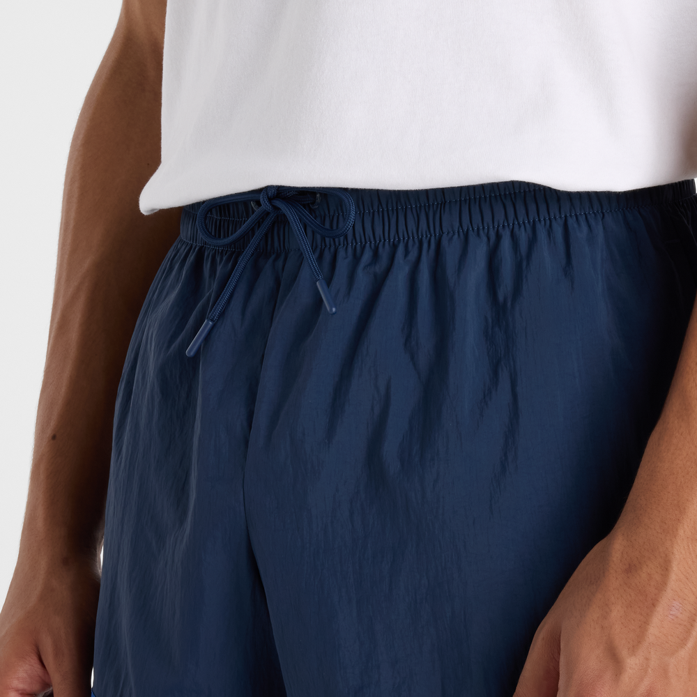 Pánske šortky New Balance MB6176MRNNY – tmavomodrá