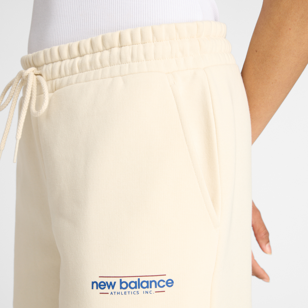 Dámske nohavice New Balance WP53903LIN – béžové