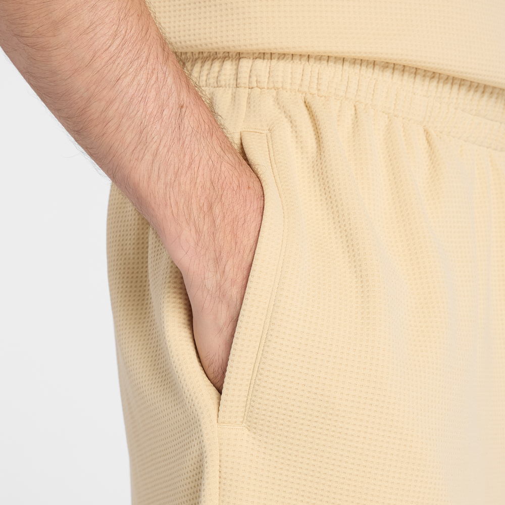 Pánske šortky New Balance MB61V17CABC – žlté