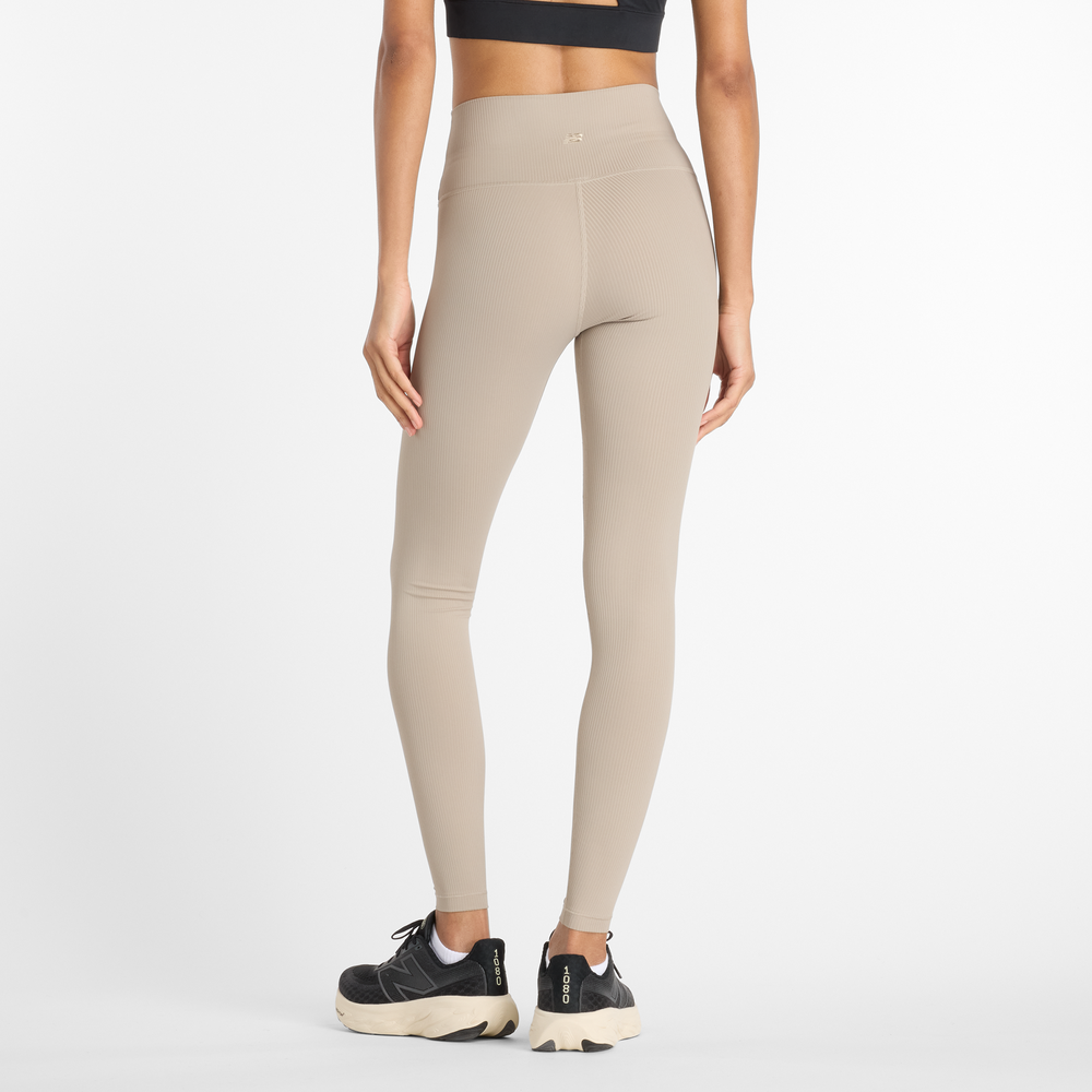 Dámske legíny New Balance WP53152ADS – béžové