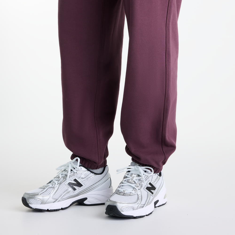Dámske nohavice New Balance Athletics – fialové