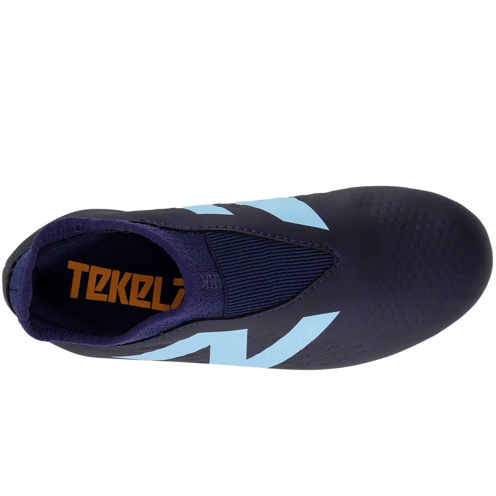 Futbalové topánky New Balance TEKELA V4+ MAGIQUEJNR FG SJT3FN45 – tmavomodrá