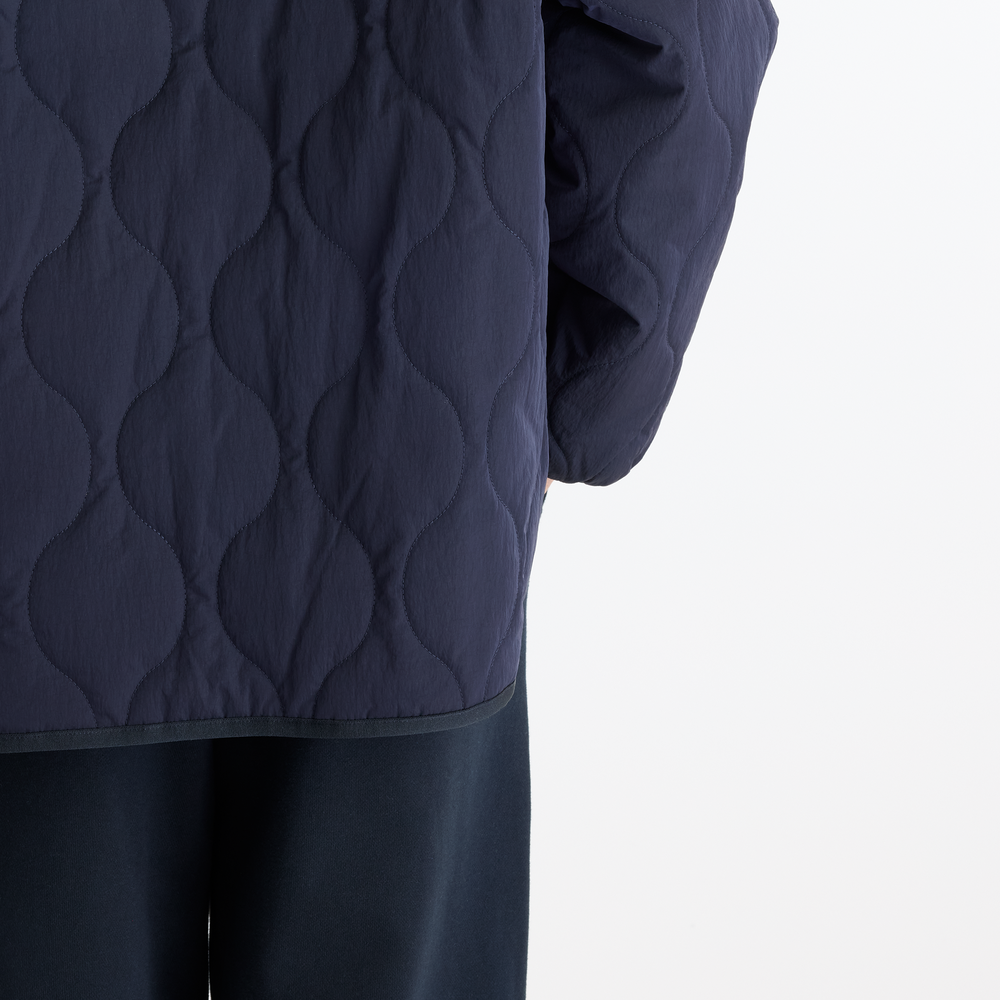 Dámska bunda New Balance Quilted Bomber – tmavomodrá