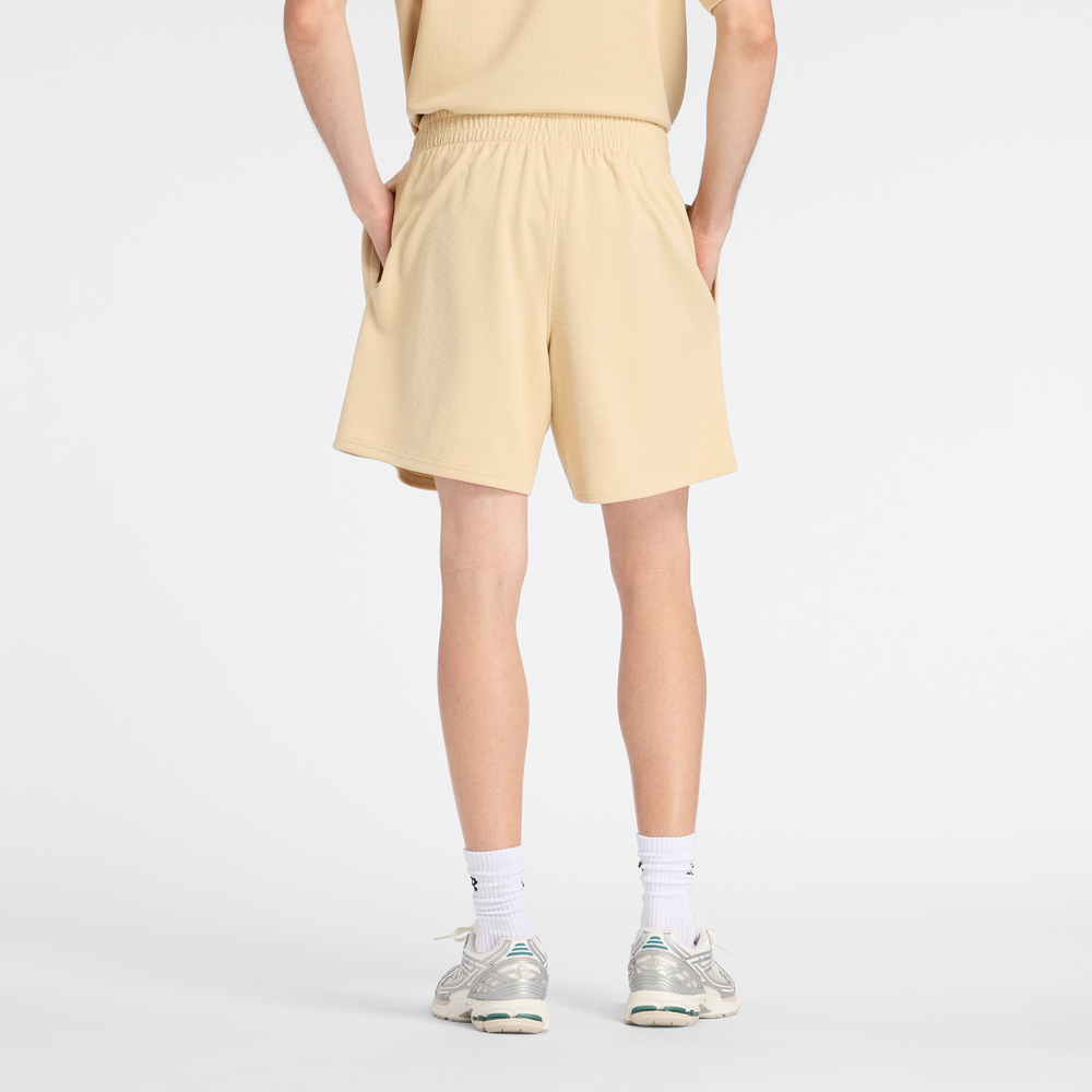 Pánske šortky New Balance MB61V17CABC – žlté