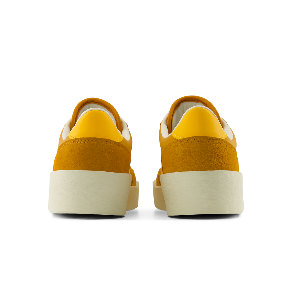 Unisex topánky New Balance U7504HH – oranžová