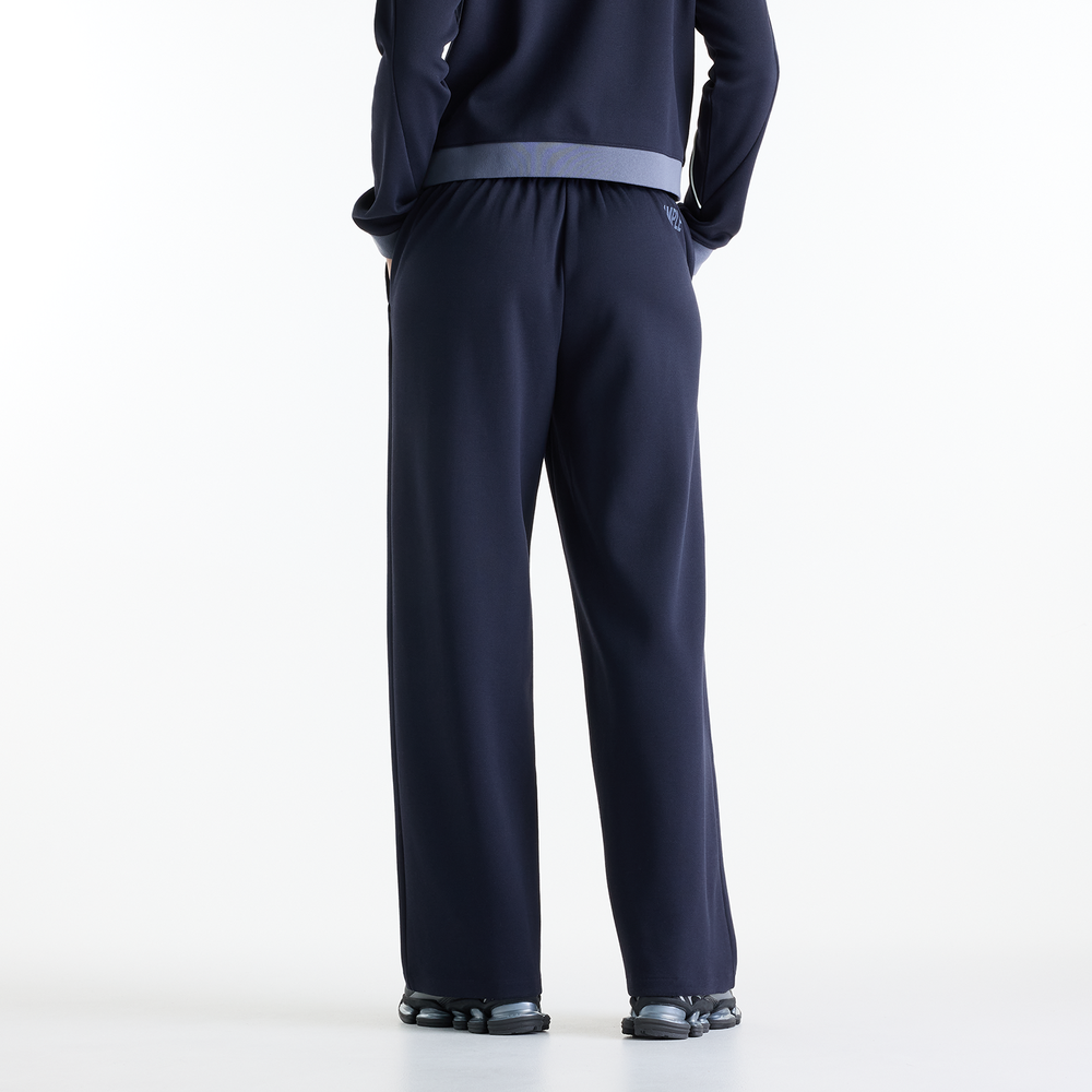 Dámske nohavice New Balance Sport Legacy – tmavomodrá