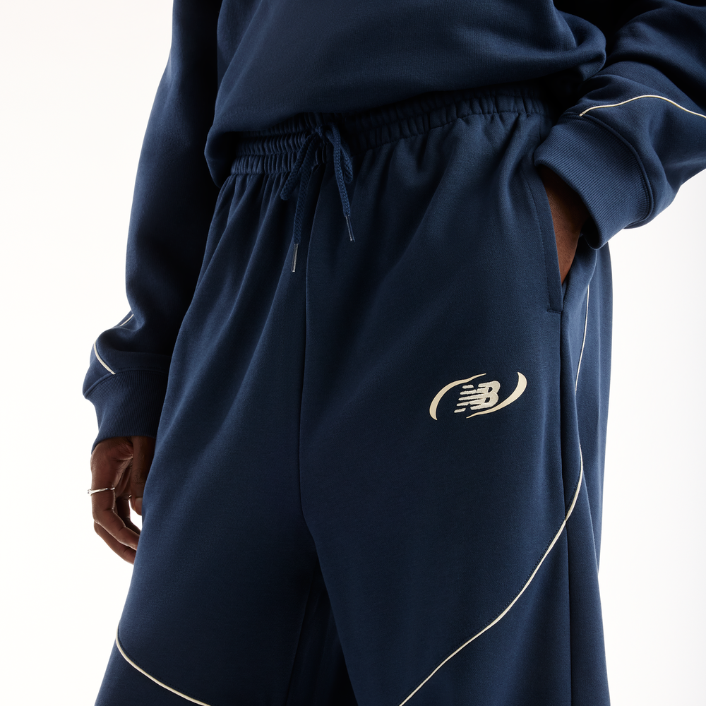 Pánske nohavice New Balance Trackside Pants – tmavomodrá