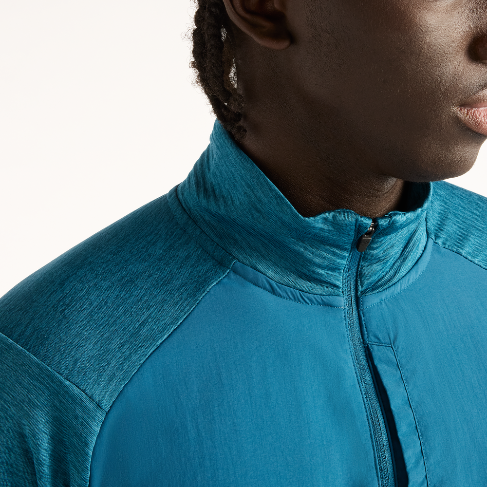 Pánska bunda New Balance RC Essential Heat Grid – modré